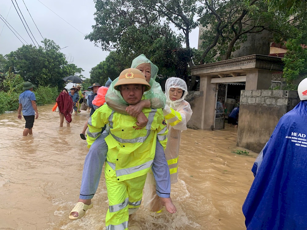 People helped each other evacuate to safe locations as the storm hit